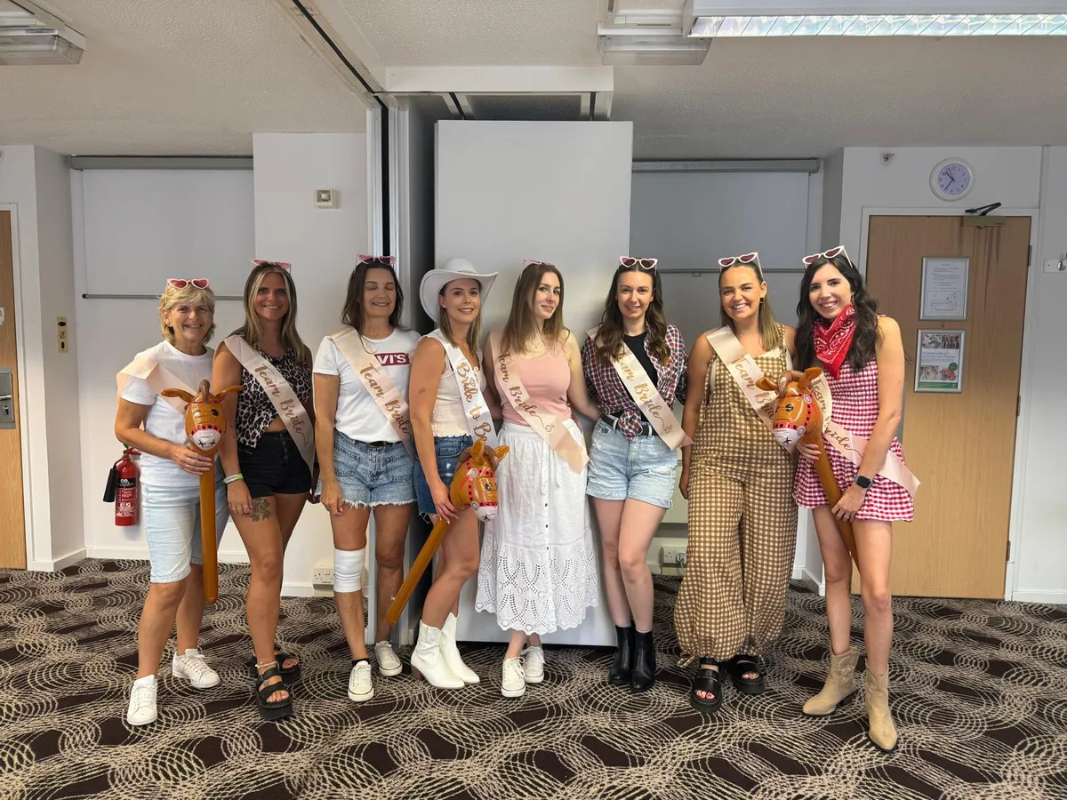 A hen party celebrating mid-routine at their dance class